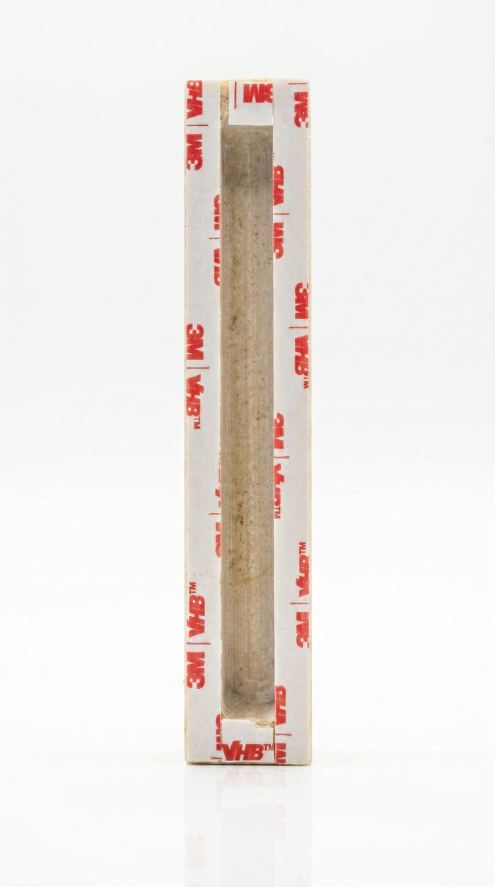 Back of Ana B’Koach Jerusalem stone mezuzah showing recessed scroll chamber and included mounting tape