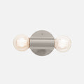 Front view of the Cylinder Double Sconce showcasing its gray gloss finish and two exposed bulbs on a white background