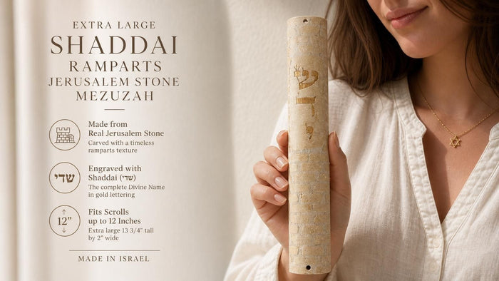 Premium hand-held view of the Jerusalem stone Shaddai Ramparts Mezuzah showing Hebrew engravings and textured surface, balanced with editorial text.