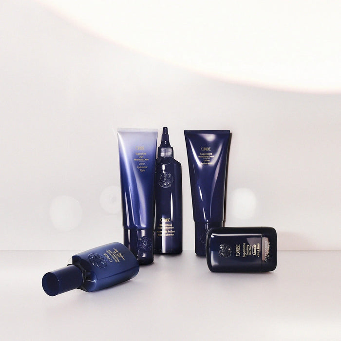 Shop Rescue Spa Oribe Featherbalm Weightless Styler for fine to medium hair, adds light hold and shine.