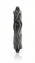 Upscale pewter mezuzah from Israel with detailed Hebrew engravings and decorative motifs, displayed on a white studio background with subtle reflection.