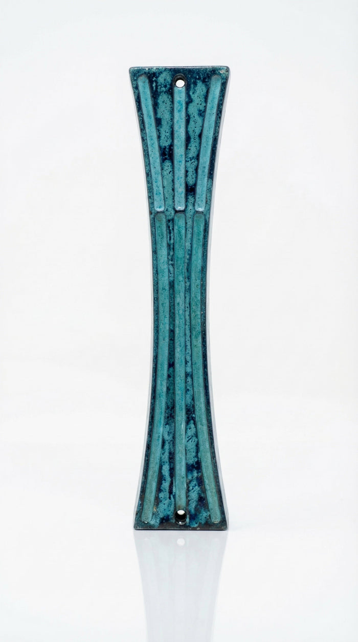 Hand-Painted Patina Pewter mezuzah case with blue-green enamel, slim hourglass shape, raised ribbed texture, and 2.8-inch scroll fit