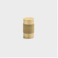 Front view of Knurled Knob showcasing cross-hatched texture in natural brass with a light gray background