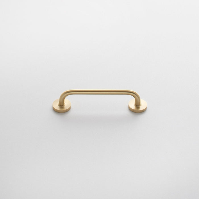 Front view of Parker Pull showcasing its rounded bar and circular mounts on a white background