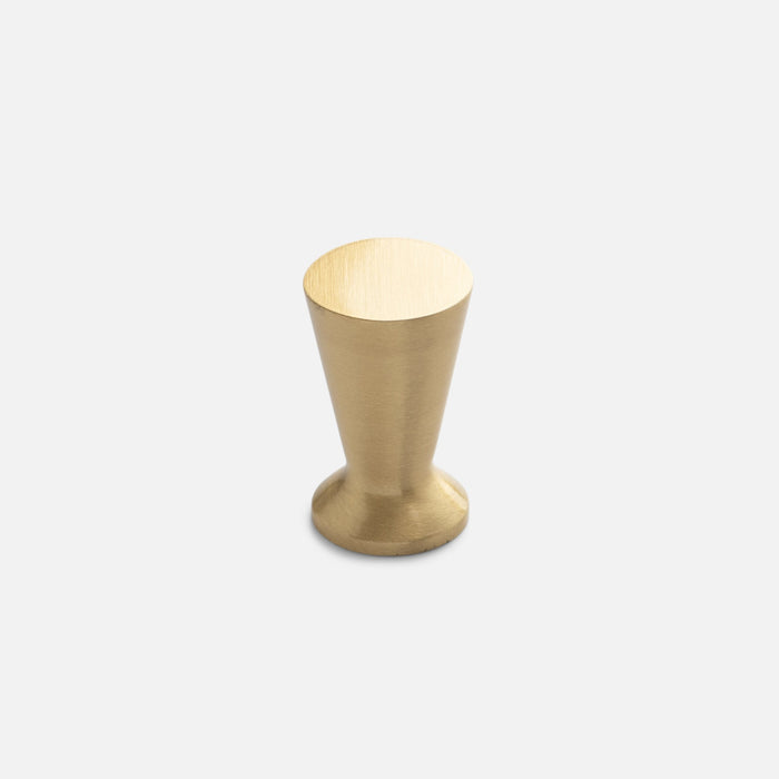 Front view of the Radcliffe Knob in natural brass, showcasing its tapered solid brass design on a light gray background