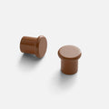 Front and side views of the Remy Knob showcasing its soft curves and pared-down silhouette on a light background