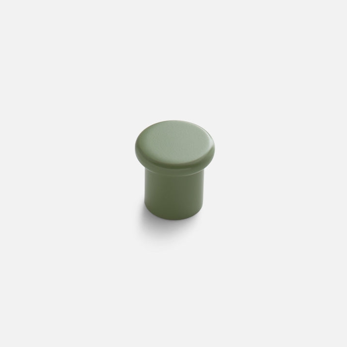 Front view of green Remy Knob showcasing its soft curves and pared-down silhouette with a white background