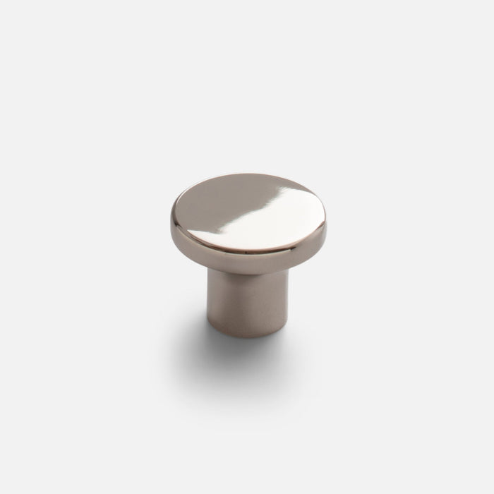 Close-up front view of the polished nickel Roland cabinet knob showcasing its round cap and cylindrical base on a white background