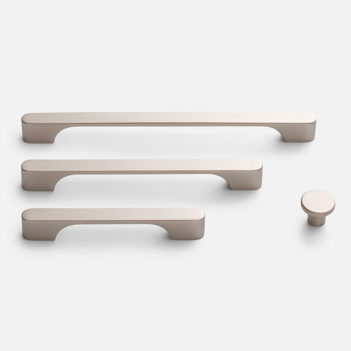 Front view of Roland Pull hardware showing three bar pulls and one round knob in natural brass on a white background