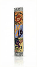 Elegant Seven Species Mezuzah made of wood and pewter, showcasing intricate Hebrew engravings on a white studio background with soft reflection.