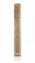 Close-up of acrylic Shema Mezuzah on white background with reflection, highlighting intricate details and craftsmanship.