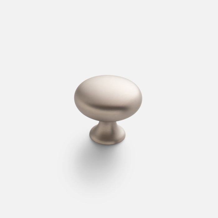 Front view of Somerset Knob showcasing its egg-shaped silhouette and solid brass construction with a plain light background