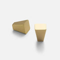 Front and side views of the Truss Knob in Natural Brass showcasing its angled geometric shape on a light gray background