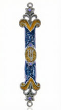 Elegant Tzfat Mezuzah with blue enamel and detailed Kabbalistic motifs, made of pewter, displayed on a white studio surface with a subtle reflection.
